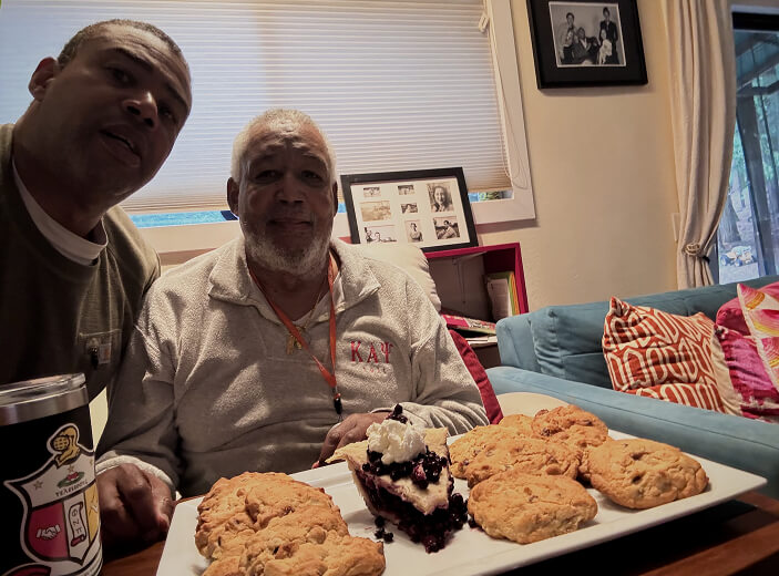 man with his dad with desserts