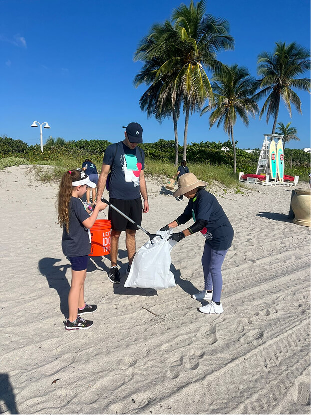 people cleaning the beach